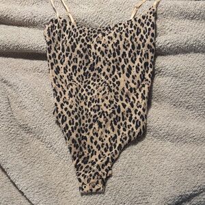 SKIMS🤎🖤 Sienna jaguar Print Thong Bodysuit in Tan and Black